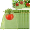Shintop 100Pcs Fruit Protection Bags, 6x9inch Green Fruit Tree Net Cover | Drawstring Mesh Tomato Bags, Fine Mesh Blocks Bugs, Breathable Sheer Organza, Gentle on Delicate Stems, Fits Apples, Mango - size: 6x9 inch