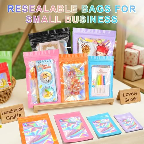ANZNKU 100PCS Holographic Red Mylar Bags, Resealable Smell Proof 2.7x3.9 | with Clear Window, Small Business Jewelry Candy Treat Sample Party Favor Packaging, Plastic Sealable Zip Goodie Gift Baggies - color: Red, size: 2.7 x 3.9 Inch