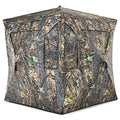 Tangkula 3 Person Pop up Ground Blind, Portable Hunting Blind with Mesh Windows, Carrying Bag & Ground Stakes, Camouflage Hunting Tent with Hub System, Camo Deer Blinds for Hunting - style: Trapezoidal window